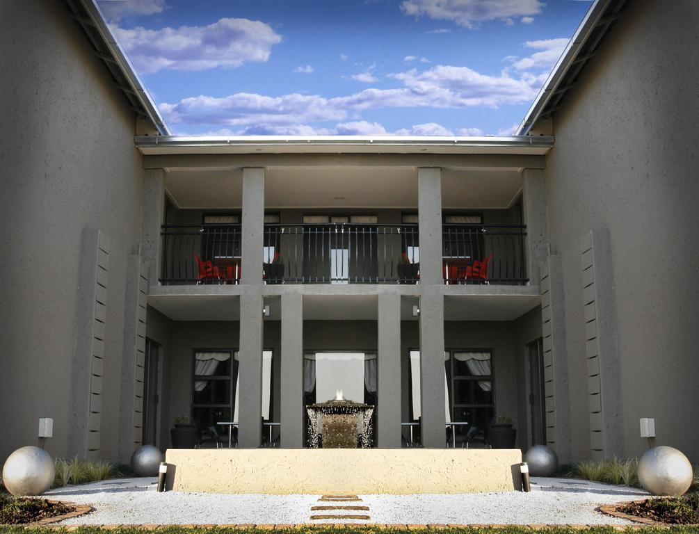 Altissimo Guesthouse Bloemfontein Zimmer foto